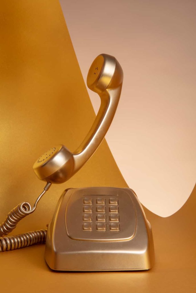 contact gold-with-old-telephone